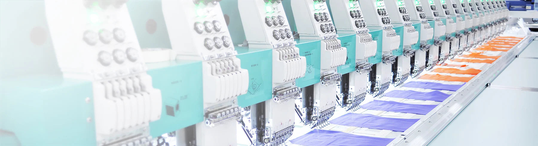 Rows of embroidery machines in Craft Clothing production